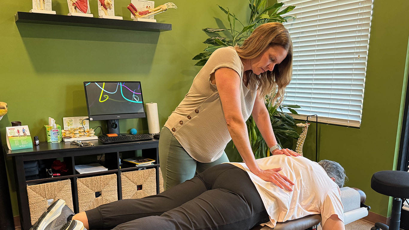 Dr Zock of Zock Family Chiropractic Cranberry Twp Pa adjusting a patient